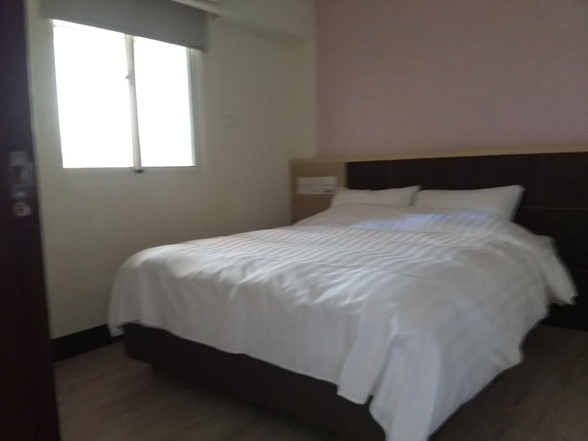 Dengfeng Milan Business Hotel Huwei Экстерьер фото