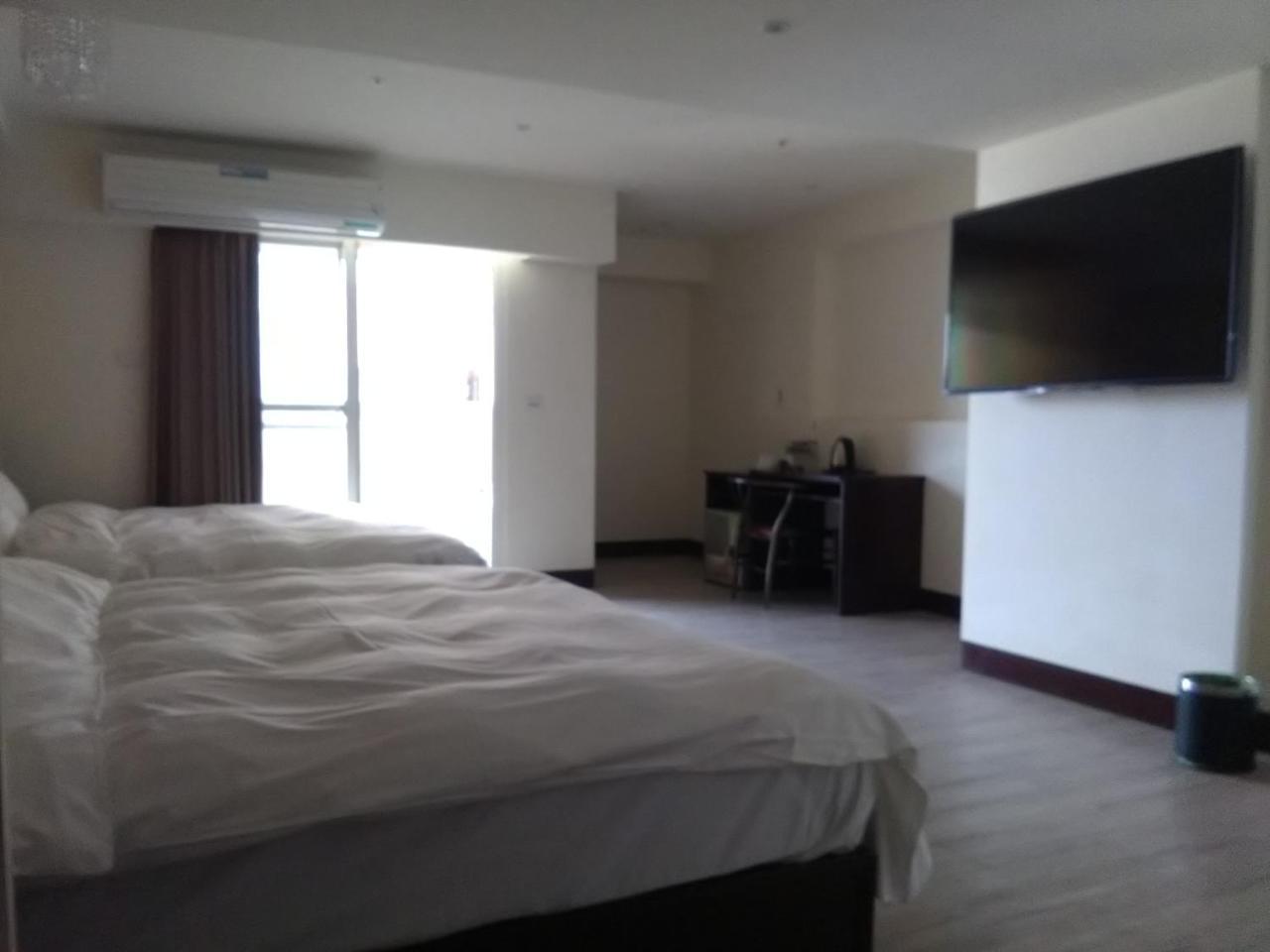 Dengfeng Milan Business Hotel Huwei Экстерьер фото